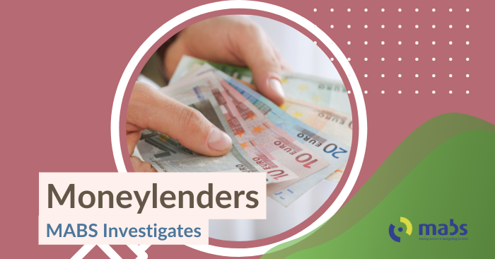 Blog cover image holds an image in the center of a hand holding a bunch of euros notes, the image is surrounded by a magnifying glass. The text on the cover photo reads "Moneylenders - MABS Investigates"