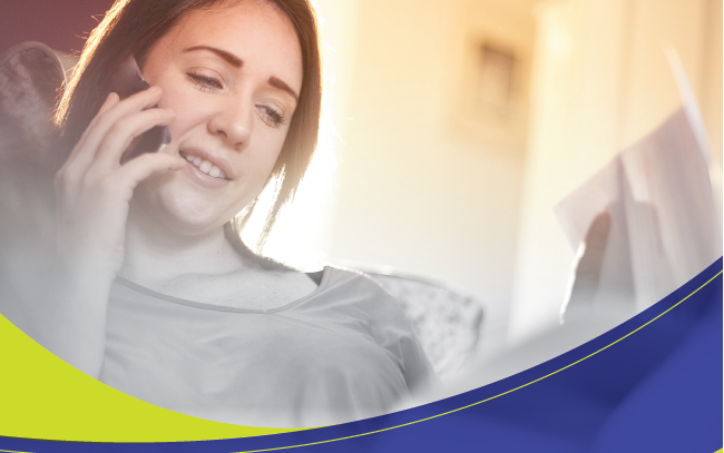 image of a woman smiling on the phone